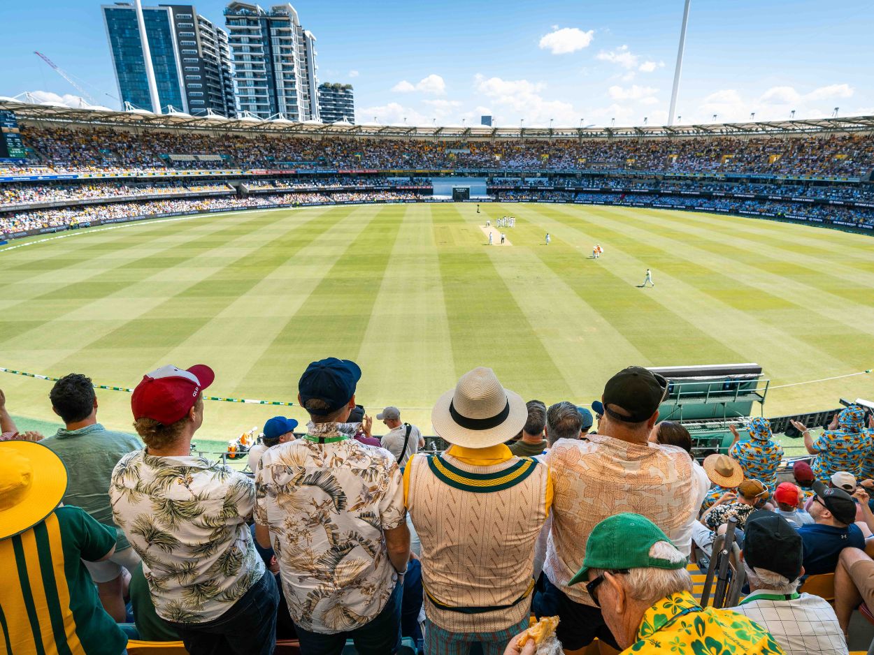 Fans watching the cricket at The Gabba. 