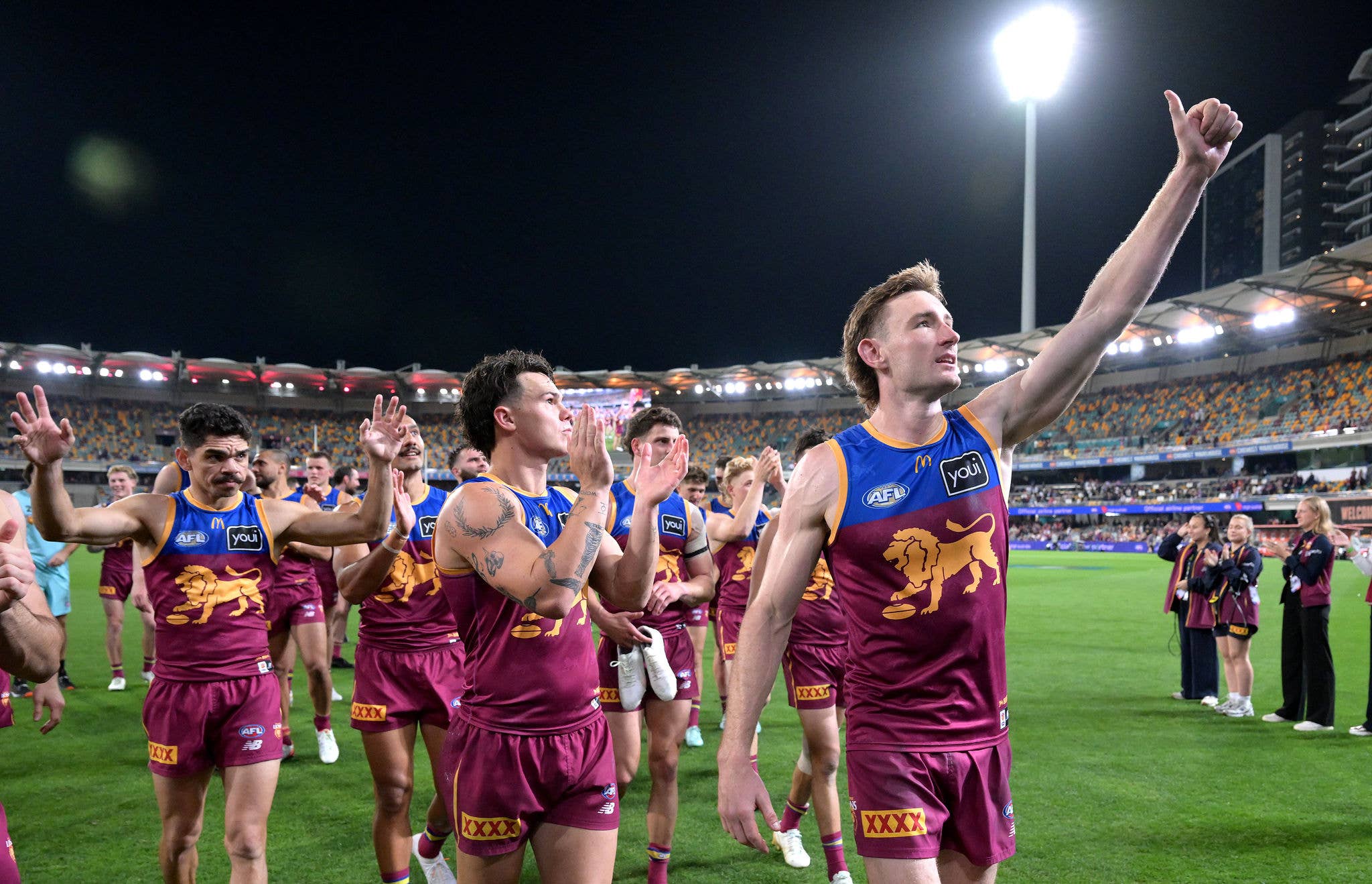 BRISBANE, AUSTRALIA - SEPTEMBER 13: Harris Andrews of the Lions and team mates celebrate victory after the AFL Semi Final match between Brisbane Lions and Gold Coast Suns at The Gabba on September 13, 2025 in Brisbane, Australia. (Photo by Bradley Kanaris/Getty Images via AFL Photos)
